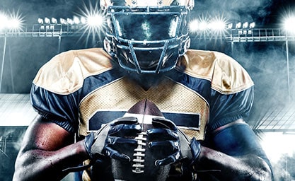 American Football Player on Stadium with Smoke and Lights